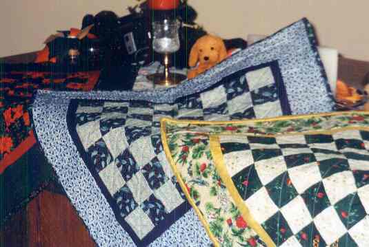 Lap Quilts can be used as wallhangings as well.