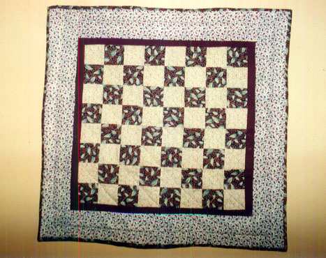 Lap Quilts can be used as wallhangings as well.