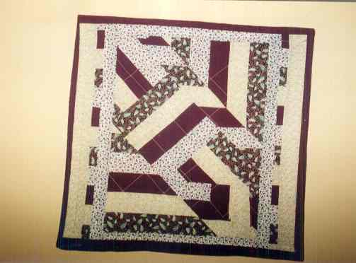Lap Quilts can be used as wallhangings as well.